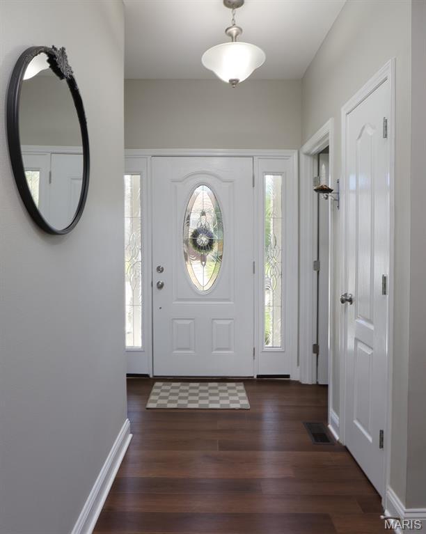 2122 Birchwood Dr, Barnhart, MO 63012 - foyer with wood finished floors and baseboards