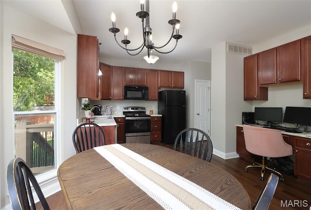 2122 Birchwood Dr, Barnhart, MO 63012 - dining area with dark wood-style floors, a chandelier, baseboards, and a desk