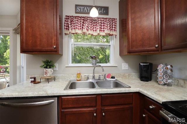 2122 Birchwood Dr, Barnhart, MO 63012 - kitchen with dishwasher, a sink, light countertops, and pendant lighting