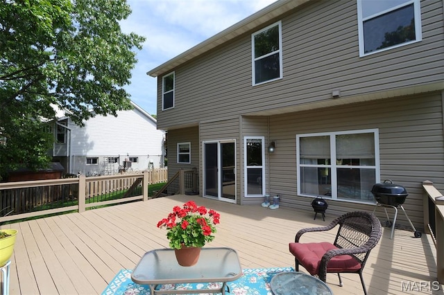 2122 Birchwood Dr, Barnhart, MO 63012 - wooden terrace with grilling area and fence
