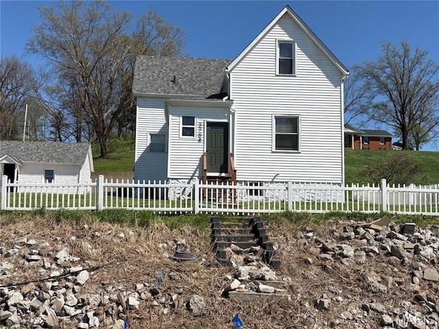 2708 Old State Route 3, Columbia, IL 62236 - view of front of home with a fenced front yard and a shingled roof