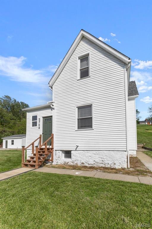 2708 Old State Route 3, Columbia, IL 62236 - view of side of home with entry steps and a lawn