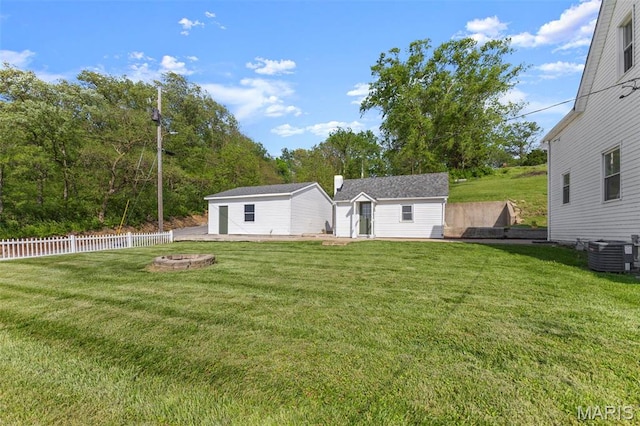 2708 Old State Route 3, Columbia, IL 62236 - back of house featuring an outdoor fire pit, an outbuilding, and cooling unit