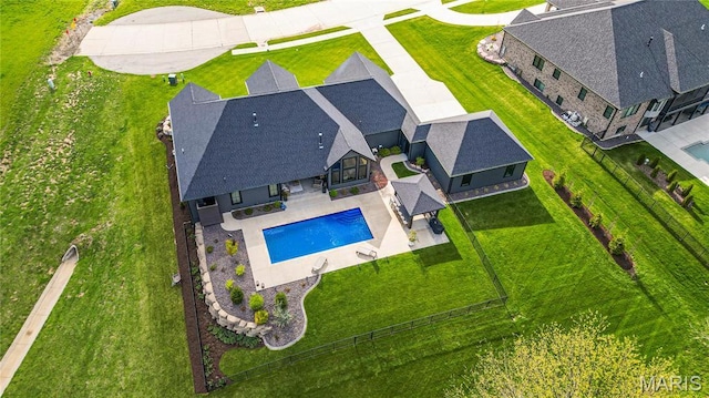 view of subject property featuring a pool area