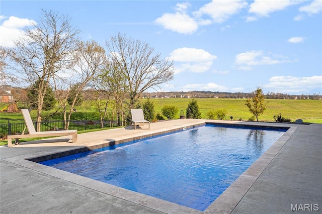 swimming pool with a patio area
