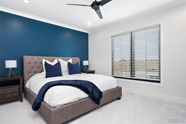 carpeted bedroom featuring recessed lighting, ceiling fan, crown molding, and baseboards