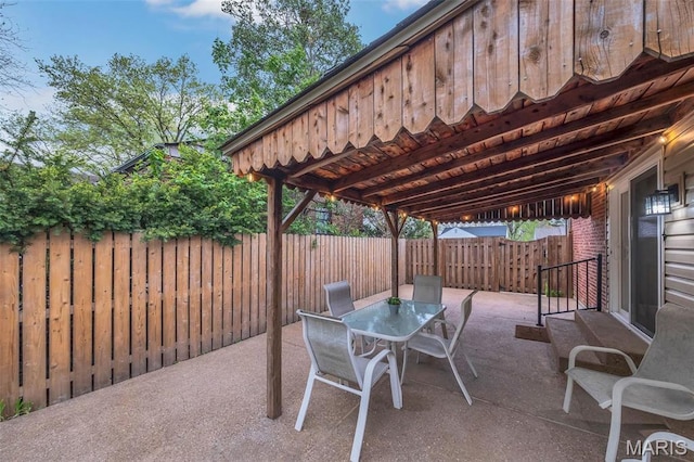 view of patio / terrace featuring a fenced backyard and outdoor dining area