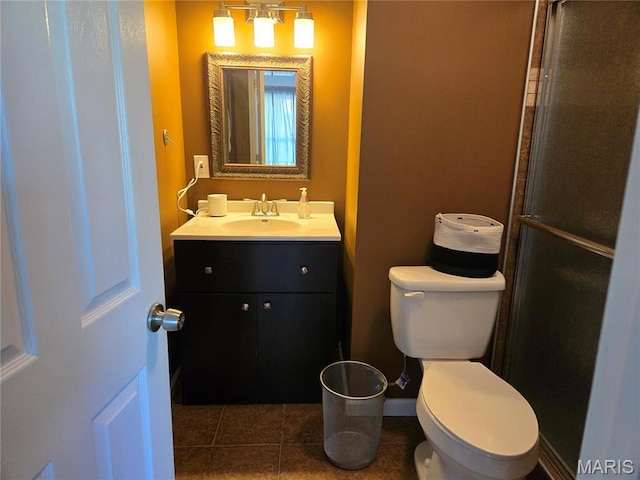 6029 Timber Hollow Ln, High Ridge, MO 63049 - bathroom with toilet, vanity, tile patterned floors, and a shower with shower door