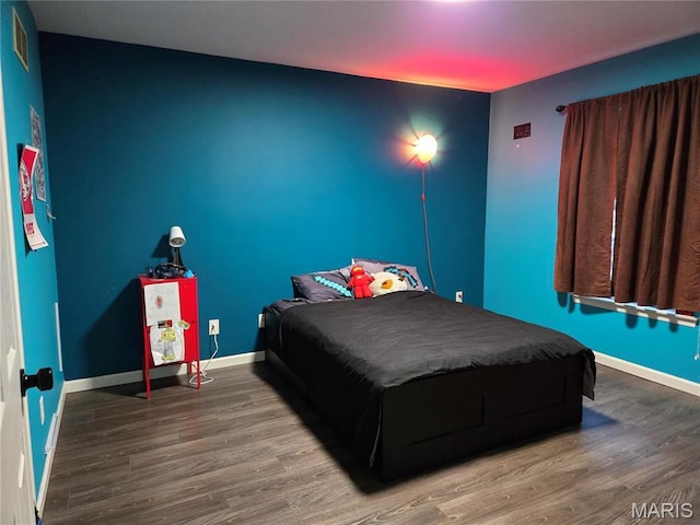 6029 Timber Hollow Ln, High Ridge, MO 63049 - bedroom with wood finished floors and baseboards
