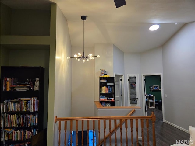 6029 Timber Hollow Ln, High Ridge, MO 63049 - hallway with an upstairs landing, wood finished floors, a chandelier, and baseboards