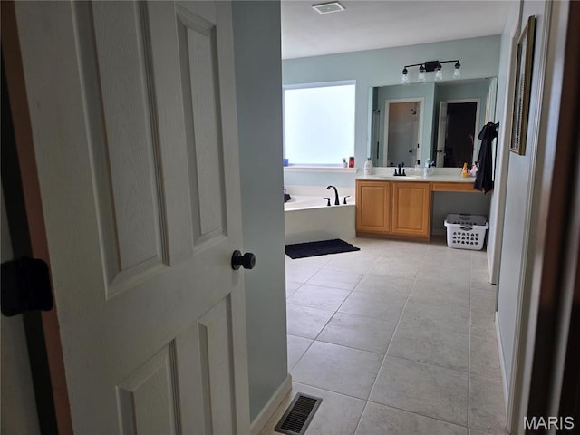 6029 Timber Hollow Ln, High Ridge, MO 63049 - bathroom featuring tile patterned floors, a bath, and vanity
