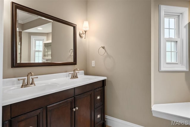 582 S Berry Rd, Webster Groves, MO 63122 - bathroom with baseboards and double vanity