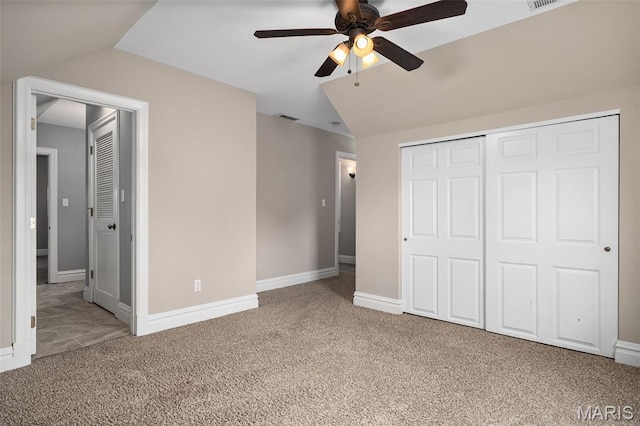 582 S Berry Rd, Webster Groves, MO 63122 - unfurnished bedroom featuring carpet flooring, vaulted ceiling, a closet, baseboards, and ceiling fan