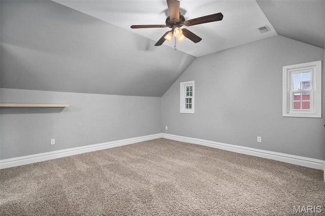 582 S Berry Rd, Webster Groves, MO 63122 - additional living space with vaulted ceiling, carpet, ceiling fan, and baseboards