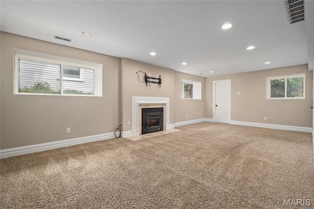 582 S Berry Rd, Webster Groves, MO 63122 - unfurnished living room with carpet floors, recessed lighting, baseboards, and a fireplace with flush hearth