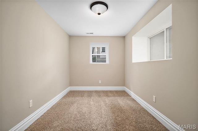 582 S Berry Rd, Webster Groves, MO 63122 - spare room featuring baseboards and carpet