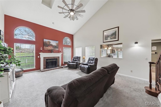 1001 Hawthorne Pl, Ofallon, IL 62269 - living area with high vaulted ceiling, carpet floors, a ceiling fan, a fireplace, and baseboards