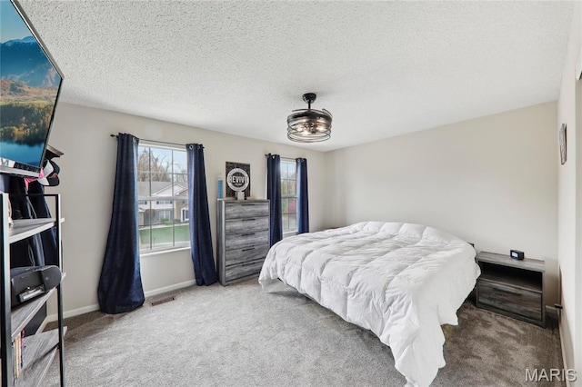 1001 Hawthorne Pl, Ofallon, IL 62269 - bedroom featuring carpet floors, baseboards, and a textured ceiling