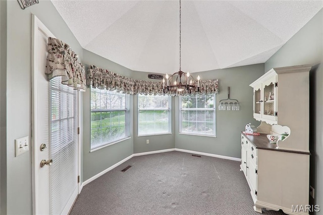 1001 Hawthorne Pl, Ofallon, IL 62269 - unfurnished dining area featuring lofted ceiling, a chandelier, carpet floors, and baseboards