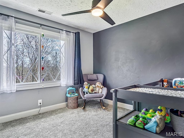 7506 D Rd, Waterloo, IL 62298 - carpeted bedroom featuring a textured ceiling, ceiling fan, and baseboards