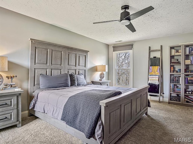 7506 D Rd, Waterloo, IL 62298 - bedroom with carpet floors, a textured ceiling, and a ceiling fan