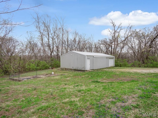 7506 D Rd, Waterloo, IL 62298 - view of grassy yard featuring an outbuilding and an outdoor structure