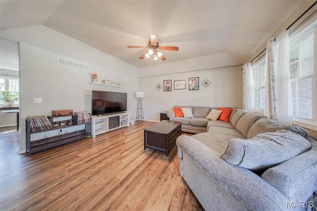19580 Lyle Ln, Waynesville, MO 65583 - living area with light wood-type flooring, ceiling fan, and vaulted ceiling