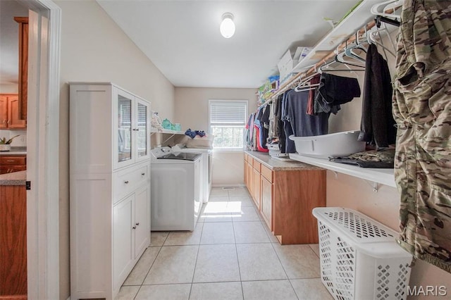 19580 Lyle Ln, Waynesville, MO 65583 - laundry area featuring separate washer and dryer and light tile patterned flooring