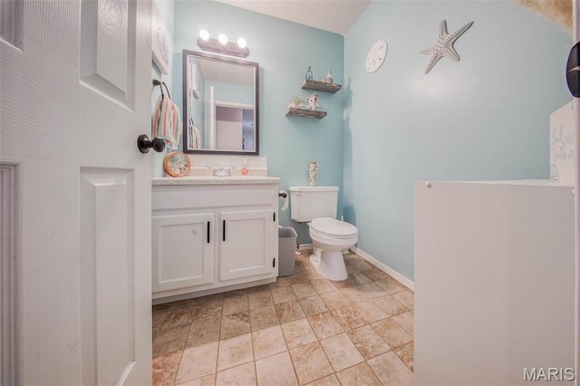 19580 Lyle Ln, Waynesville, MO 65583 - half bath with toilet, vanity, and baseboards