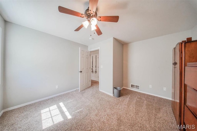 19580 Lyle Ln, Waynesville, MO 65583 - unfurnished bedroom with carpet flooring, baseboards, and ceiling fan