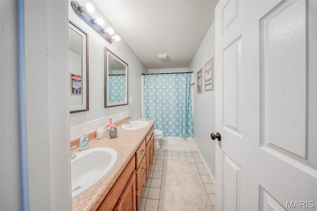 19580 Lyle Ln, Waynesville, MO 65583 - full bathroom with toilet, tile patterned floors, double vanity, baseboards, and a shower with curtain