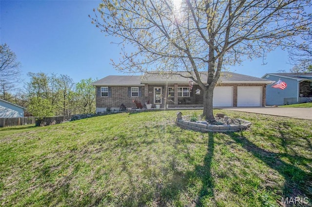 19580 Lyle Ln, Waynesville, MO 65583 - ranch-style house featuring brick siding, a garage, and driveway