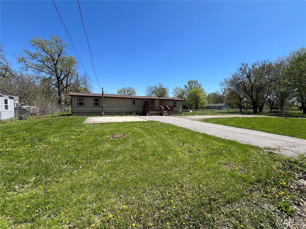 4118 Division St, Granite City, IL 62040 - rear view of house featuring a patio