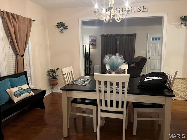 111 W Broadway St, Hayti, MO 63851 - dining area featuring a chandelier and wood finished floors