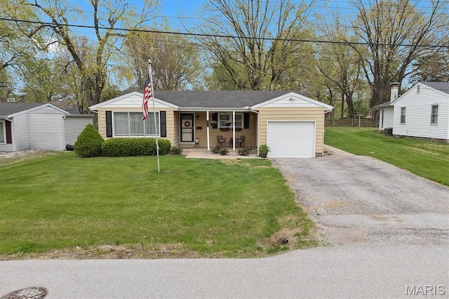 ranch-style house with a garage, a porch, a front yard, driveway, and central AC