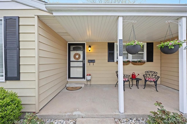 property entrance with a porch