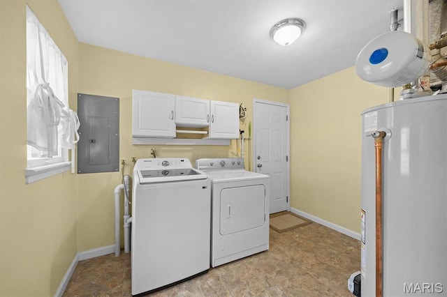 washroom featuring electric panel, cabinet space, gas water heater, washer and dryer, and baseboards