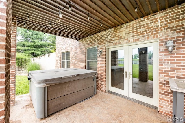 92 Rinderer Rd, Trenton, IL 62293 - view of patio / terrace featuring french doors and a hot tub
