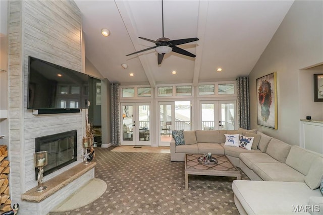 616 W Capri Dr, Bonne Terre, MO 63628 - carpeted living area with a large fireplace, ceiling fan, french doors, recessed lighting, and high vaulted ceiling