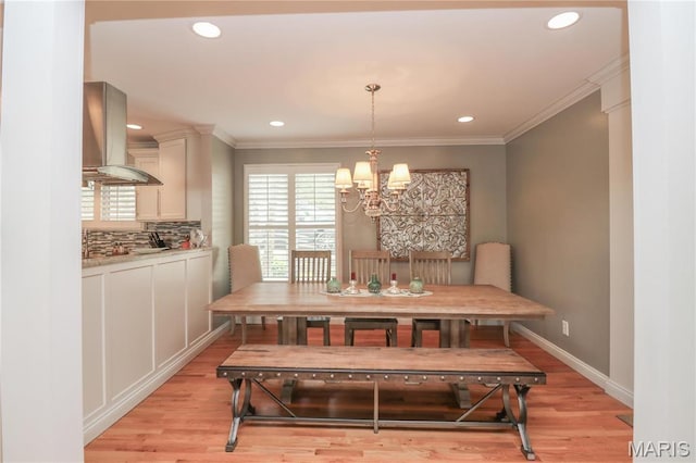 616 W Capri Dr, Bonne Terre, MO 63628 - dining room with light wood-style floors, a chandelier, crown molding, recessed lighting, and baseboards