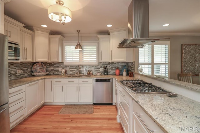 616 W Capri Dr, Bonne Terre, MO 63628 - kitchen featuring stainless steel appliances, a sink, island range hood, crown molding, and backsplash