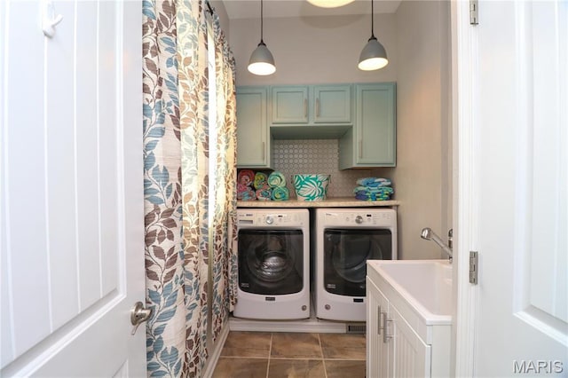 616 W Capri Dr, Bonne Terre, MO 63628 - laundry area with washer and clothes dryer, cabinet space, and tile patterned floors