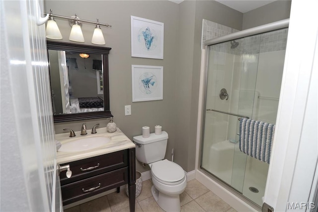 616 W Capri Dr, Bonne Terre, MO 63628 - bathroom with a shower stall, vanity, toilet, tile patterned flooring, and connected bathroom