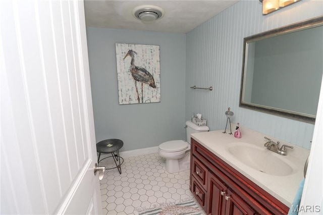 616 W Capri Dr, Bonne Terre, MO 63628 - bathroom featuring vanity, toilet, baseboards, and tile patterned floors