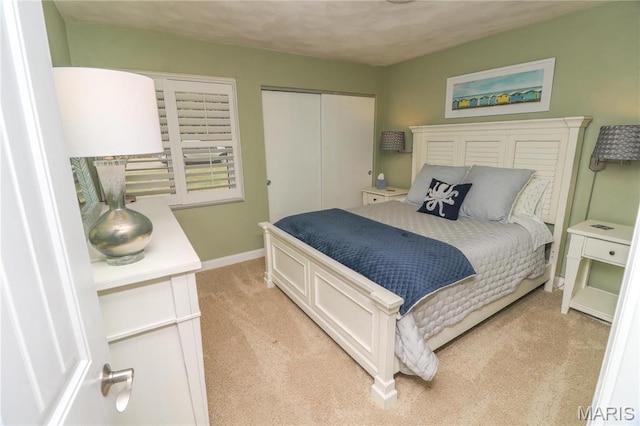 616 W Capri Dr, Bonne Terre, MO 63628 - bedroom with light colored carpet, a closet, and baseboards
