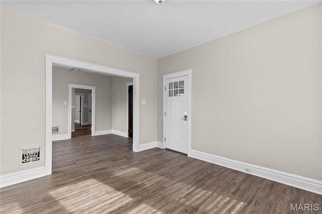 4913 Devonshire Ave, Saint Louis, MO 63109 - unfurnished room with wood finished floors and baseboards