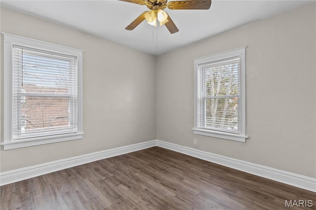 4913 Devonshire Ave, Saint Louis, MO 63109 - empty room with dark wood finished floors, baseboards, and a ceiling fan
