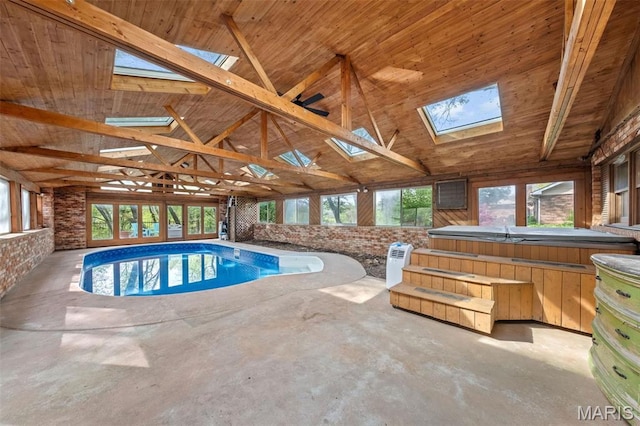 4044 Locke Ave, Bridgeton, MO 63044 - indoor pool featuring a skylight and an indoor hot tub