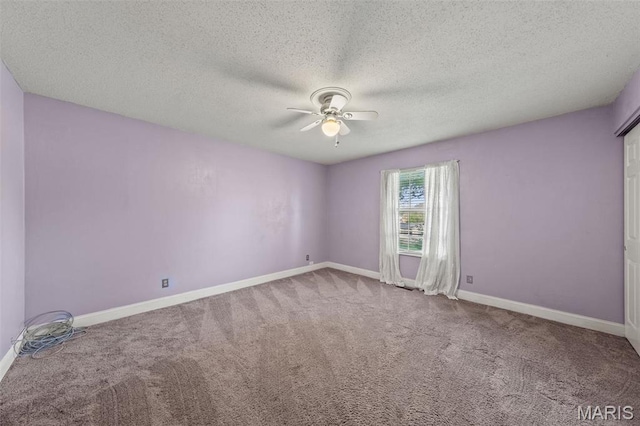 4044 Locke Ave, Bridgeton, MO 63044 - carpeted spare room with ceiling fan, baseboards, and a textured ceiling