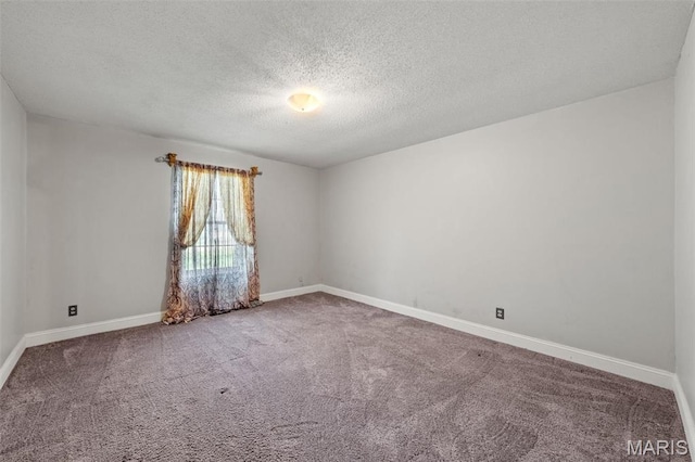 4044 Locke Ave, Bridgeton, MO 63044 - empty room featuring carpet flooring, a textured ceiling, and baseboards